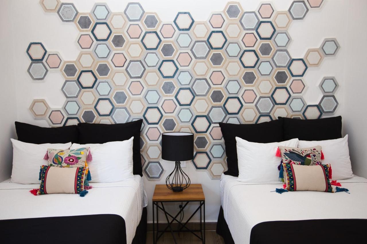 Casa Chukum Hotel Bacalar Bagian luar foto Hexagon wall art