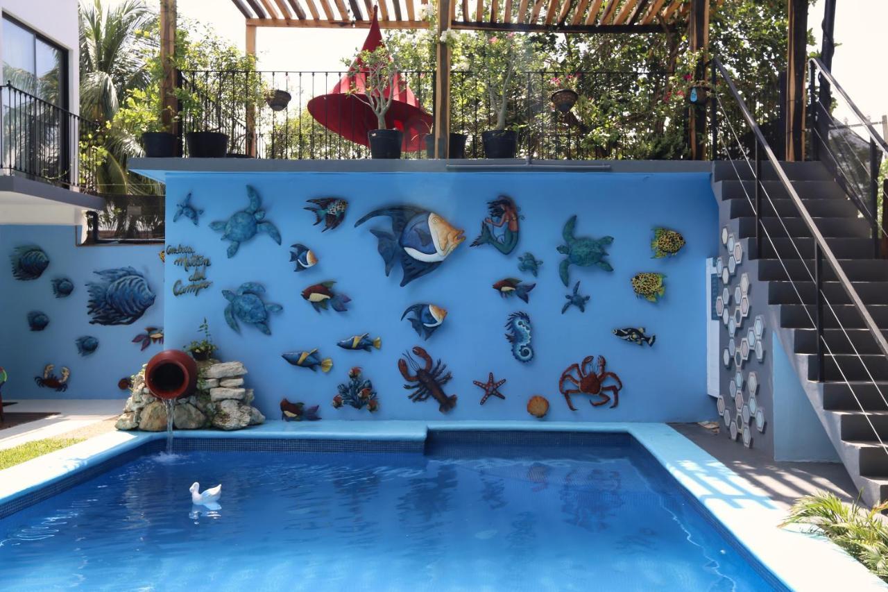 Casa Chukum Hotel Bacalar Bagian luar foto The pool at the home of the artist