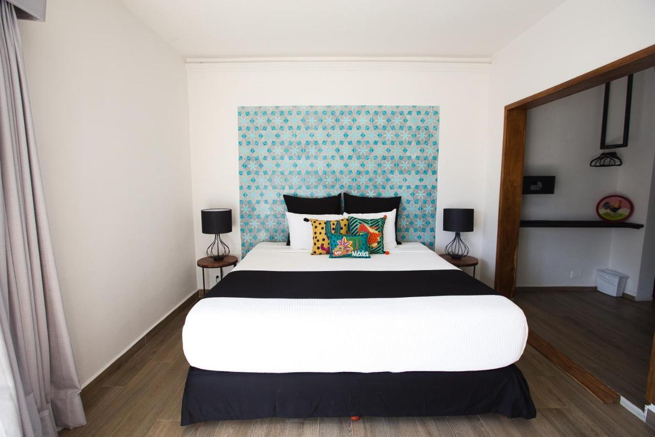 Casa Chukum Hotel Bacalar Bagian luar foto A bedroom at the hotel
